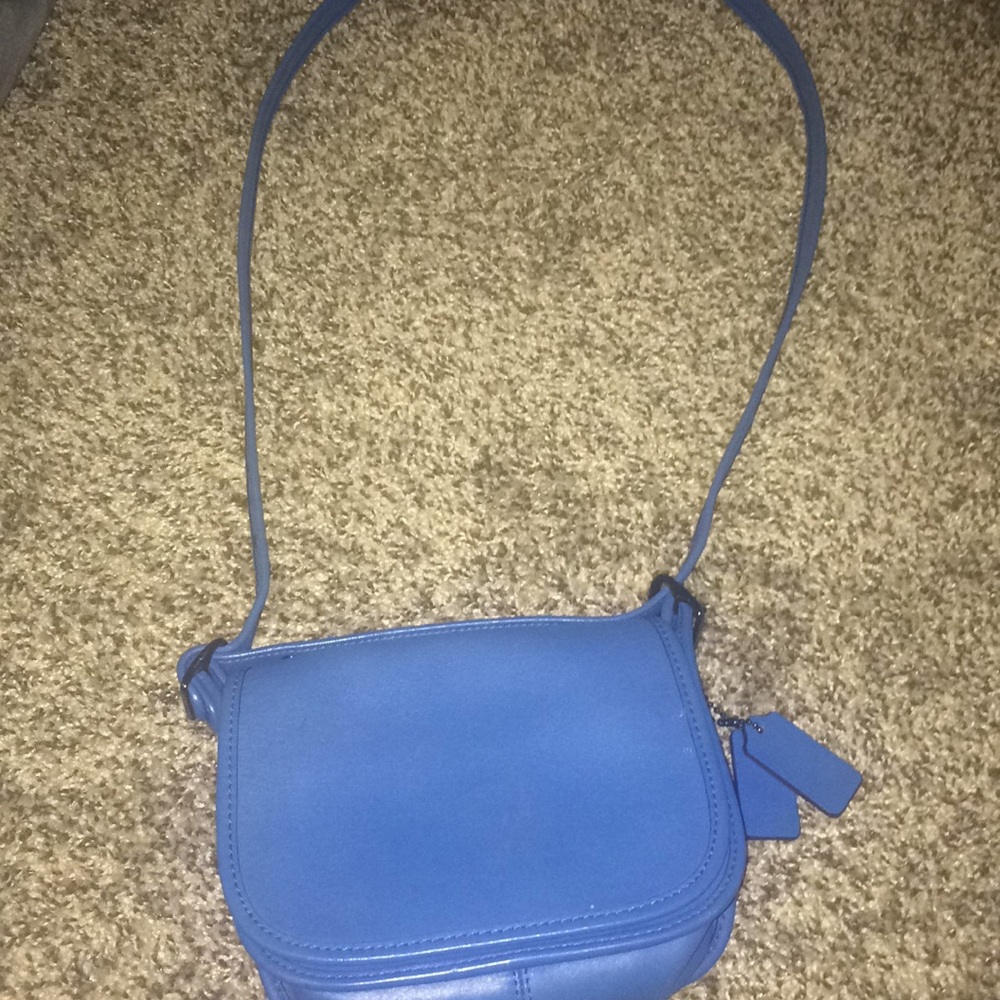 Less than a year old coach sky blue bag!